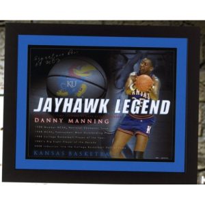 Hand Signed Danny Manning Photo, holding bastkeball with Jayhawk Legend and career highlights printed, as well as KU basketball in background